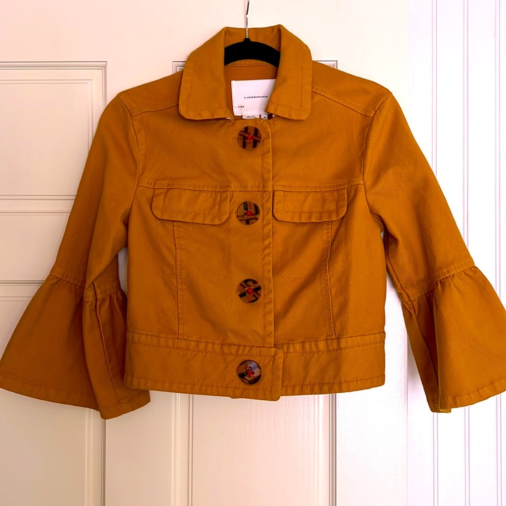 Anthropologie cropped jacket with flutter sleeves. Beautiful oversized buttons